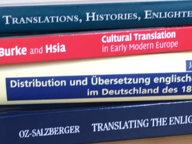 Pile of books on translation